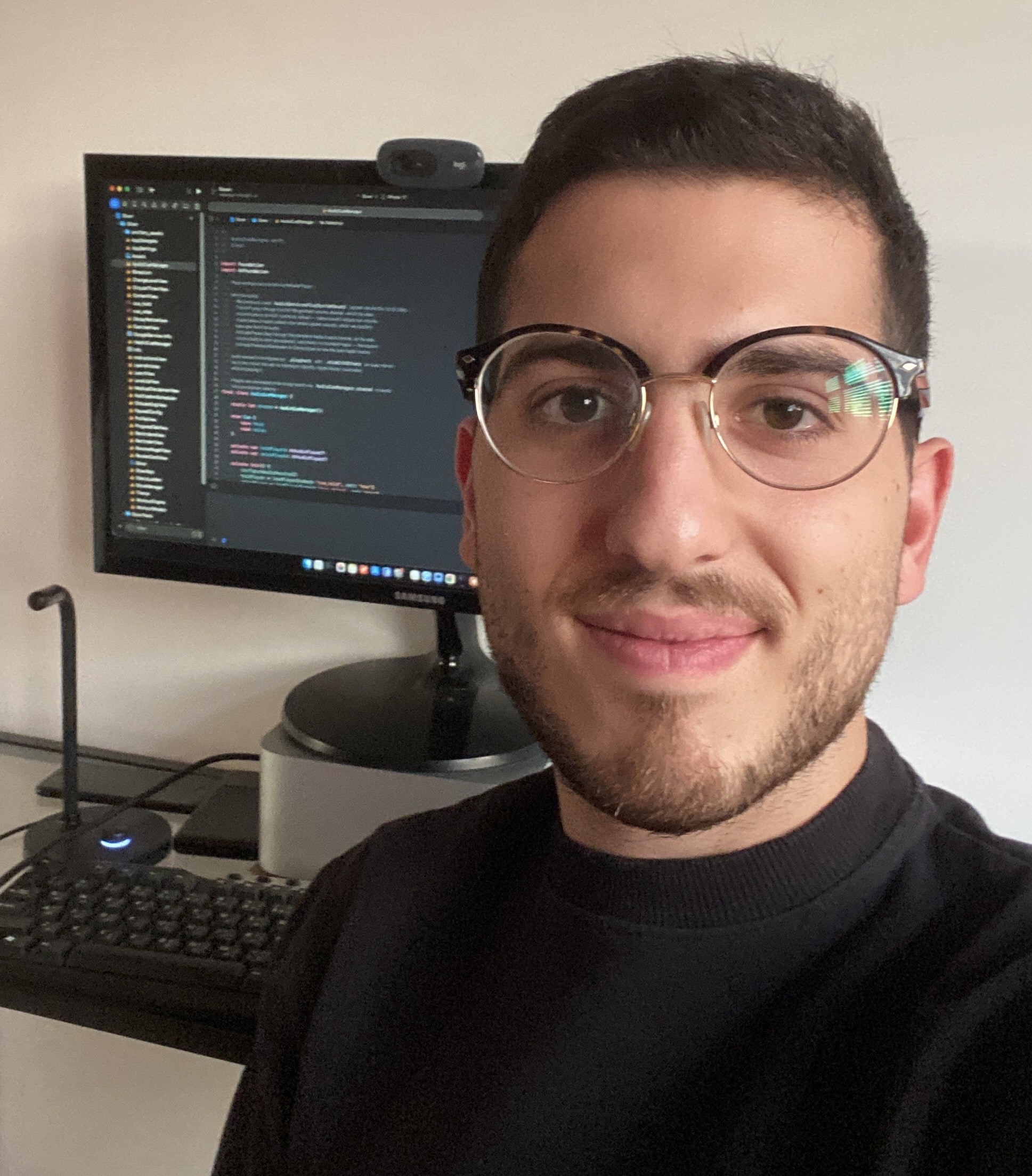 Joseph, founder of Cortexity, at his desk